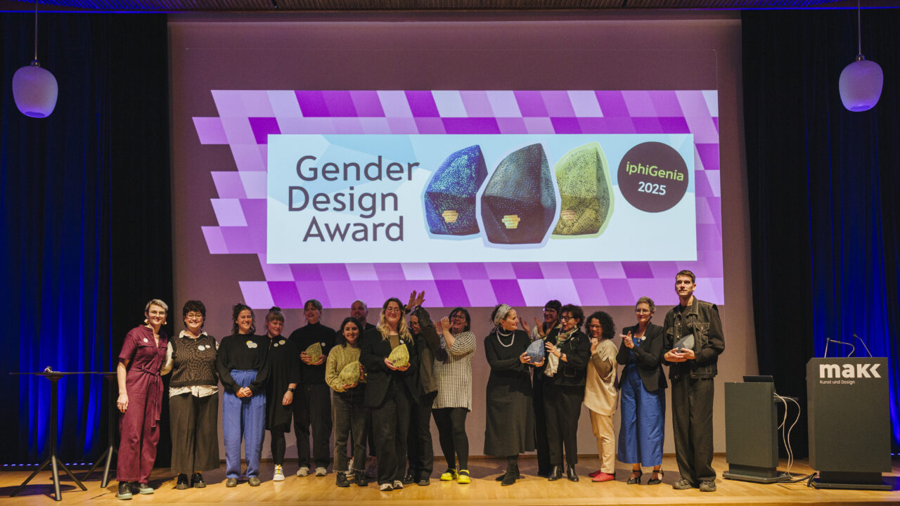 iphiGenia Award ceremony 2025 at Museum of Applied Arts Cologne, Groupphoto on stage: All winners with their trophies, award jury and moderator of the ceremony. 